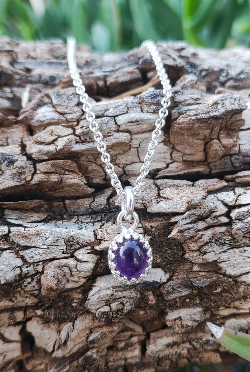 Amethyst Anhänger in Kröhnchen Fassung